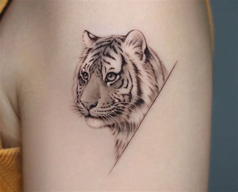 feminine small tiger tattoo|10+ Womens Feminine Tiger Tattoo Ideas That Will Blow Your。